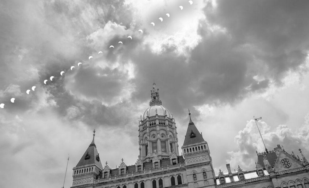 solar eclipse over Connecticut State Capitol.